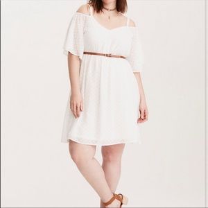 Cold shoulder, white mini dress.